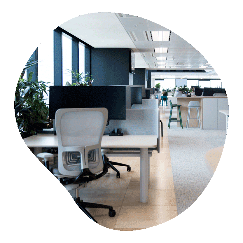 Empty open-plan office with desks and chairs
