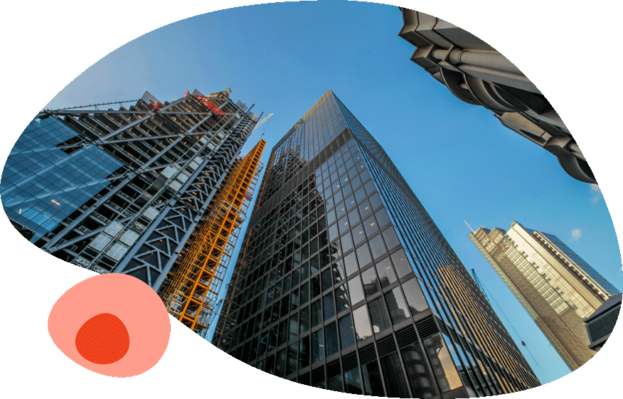 Glass office towers seen from street level